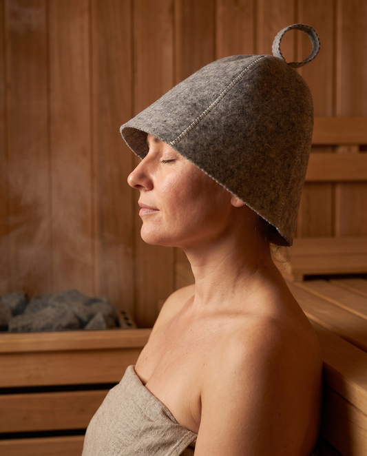 Side profile of the Sawna gray sauna hat worn in a sauna
